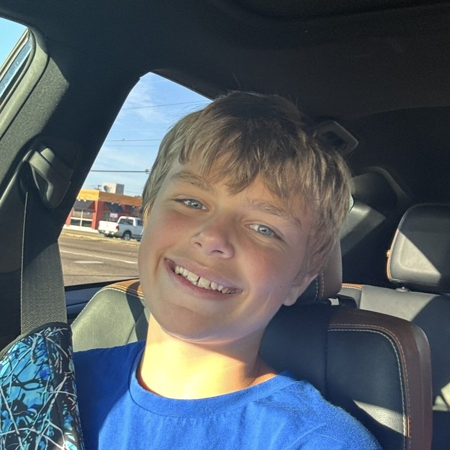Connor Taylor smiling in the sunshine